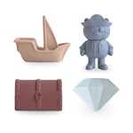 Mushie mold-free silicone bath toys set in soft, neutral colors, perfect for safe baby play.