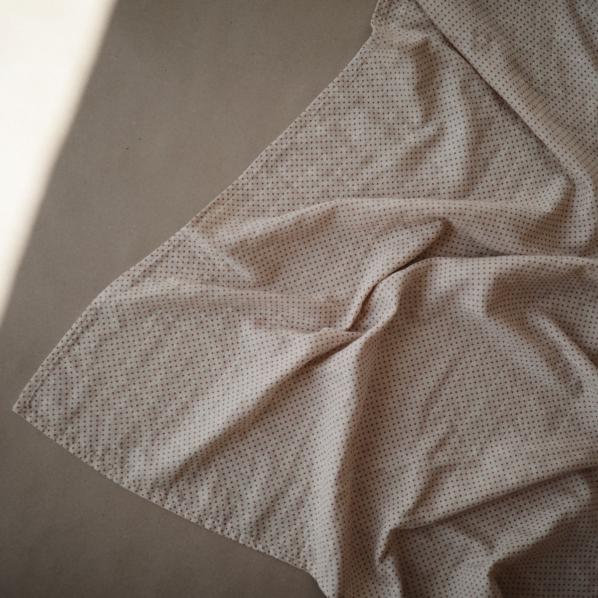 Soft, breathable Mushie organic cotton muslin swaddle blanket