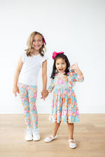 Mila & Rose Preppy Pumpkins soft baby leggings, orange pumpkin print.