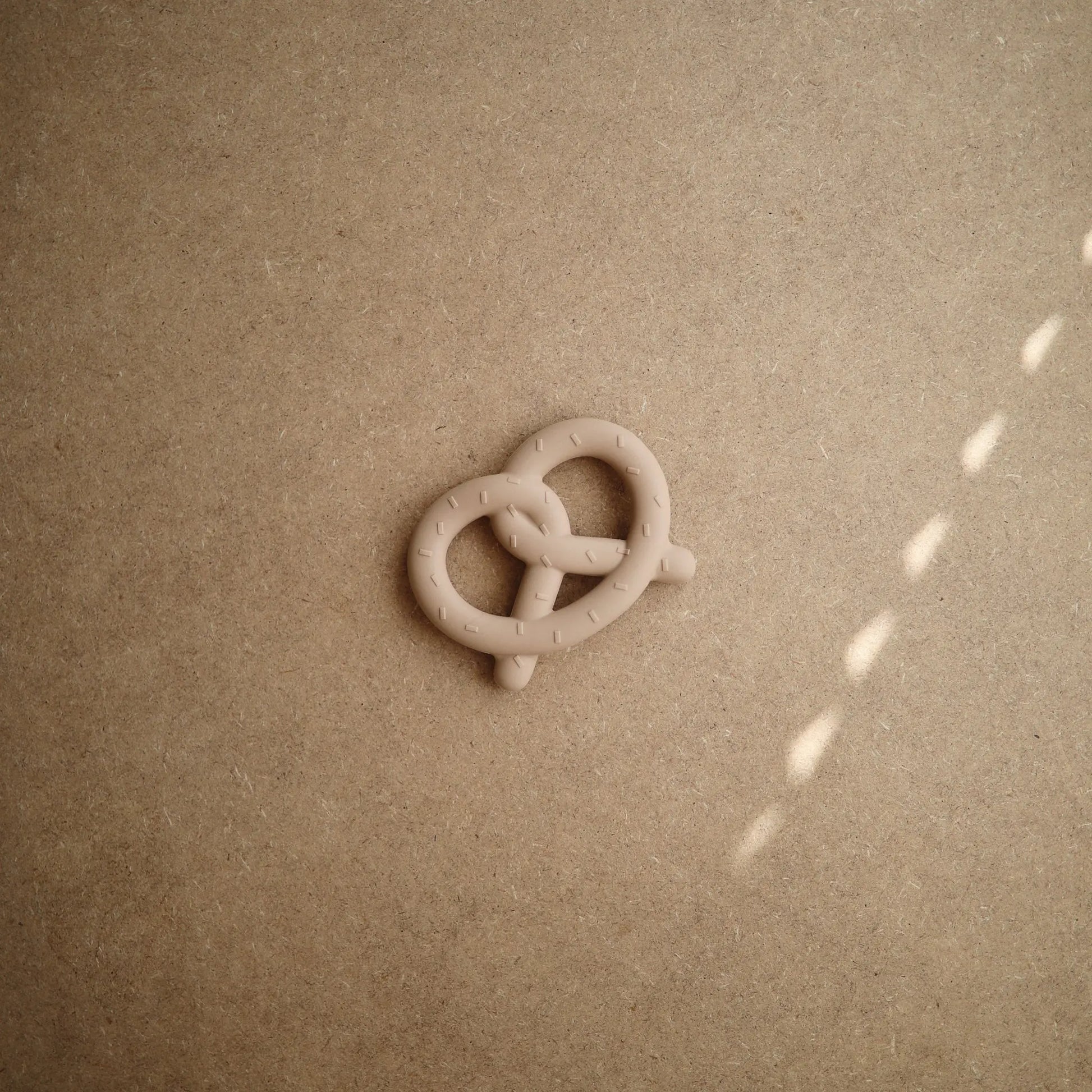 Pretzel Teether for Babies Made from Non-Toxic Food-Grade Silicone Mushie Everetts Place: Online Boutique