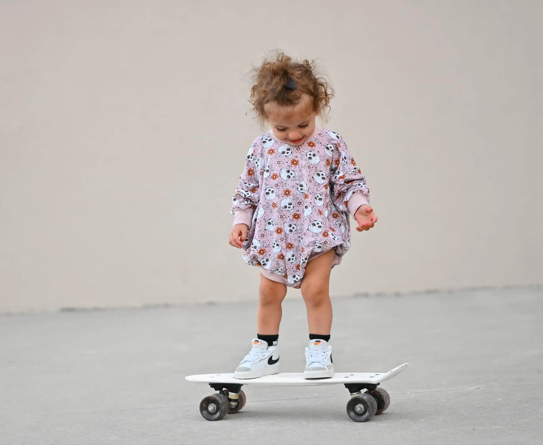 Little Joy Co. Purple Floral Skulls Bamboo Bubble Romper For Baby - Apparel & Accessories > Clothing > Baby & Toddler Clothing > Baby & Toddler Outfits