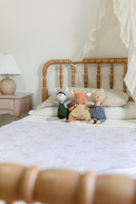 Little Mae & Co baby crib quilted blanket with ribbon bows