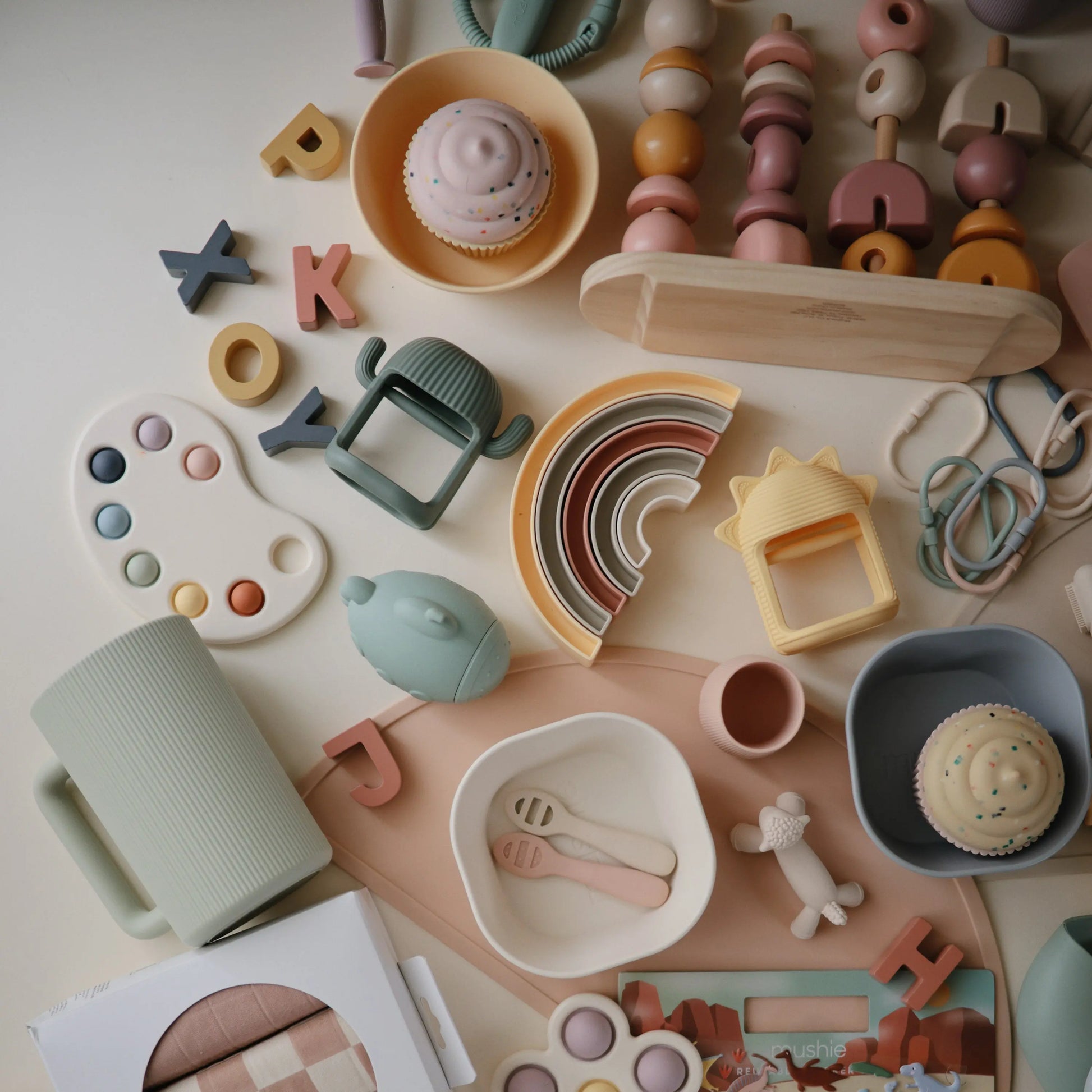 Rainbow Stacker Toy from Danish Hygge Collection for Learning and Play Mushie Everetts Place: Online Boutique