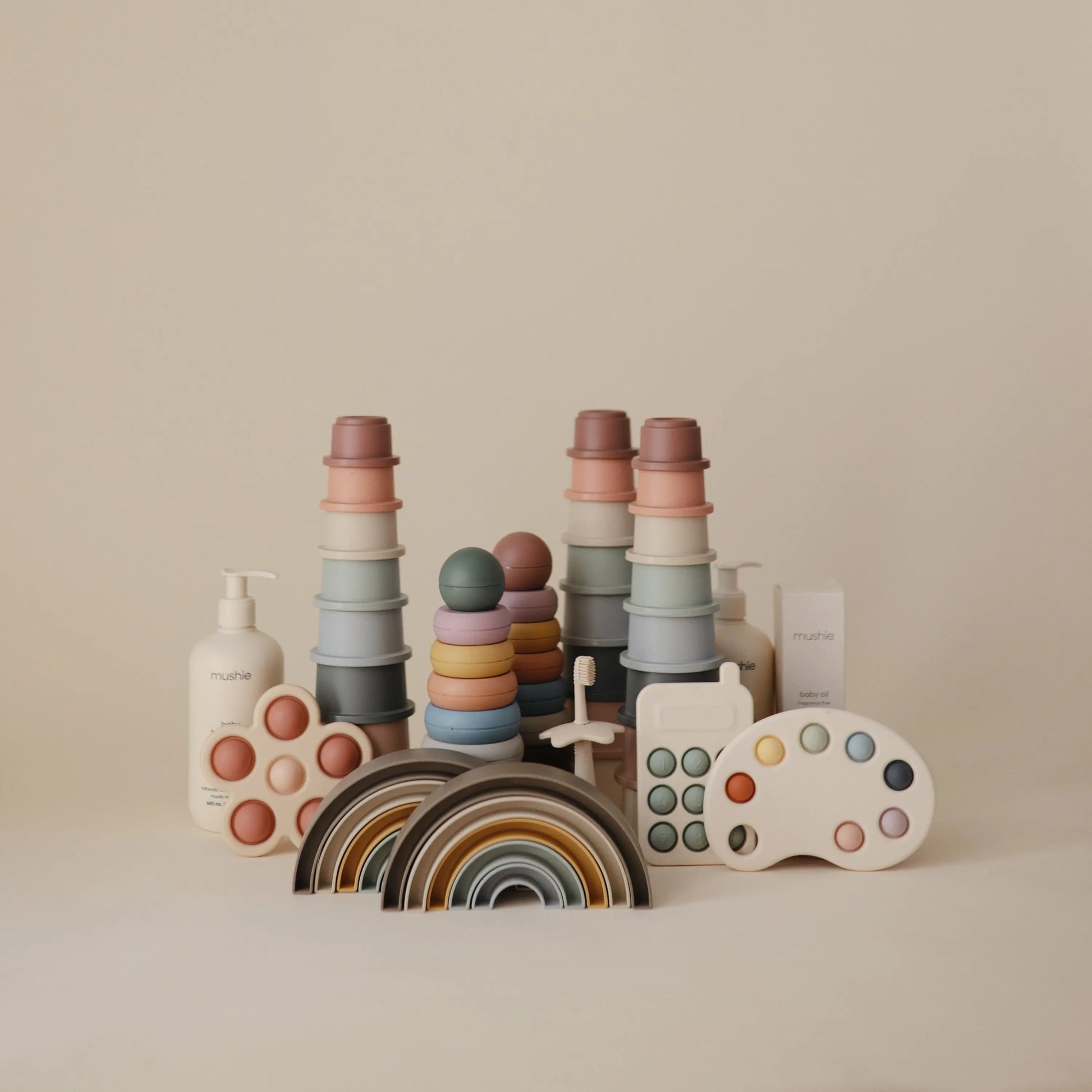 Rainbow Stacker Toy from Danish Hygge Collection for Learning and Play Mushie Everetts Place: Online Boutique