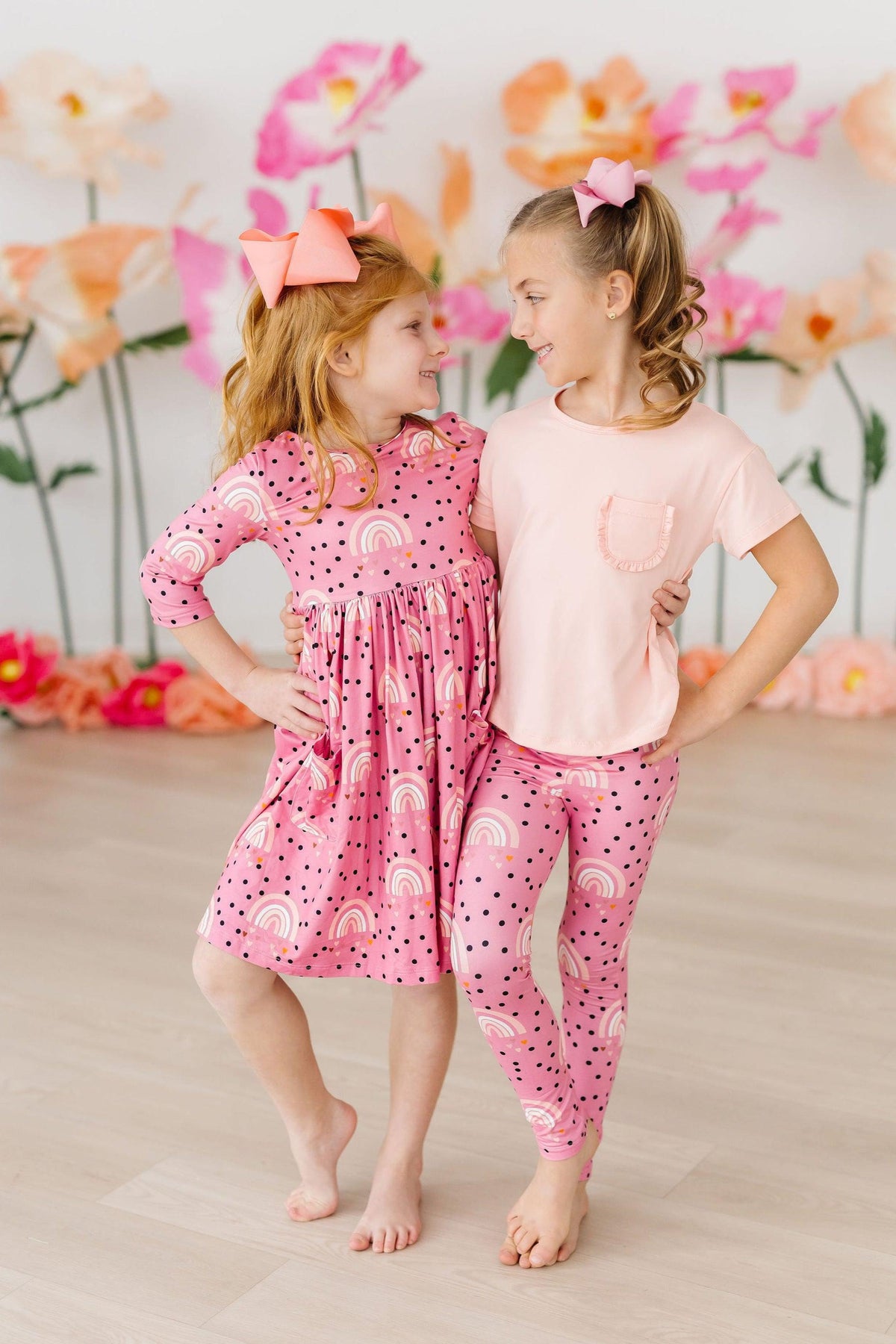 Mila & Rose Rainbow Wishes organic baby leggings with colorful stripes.