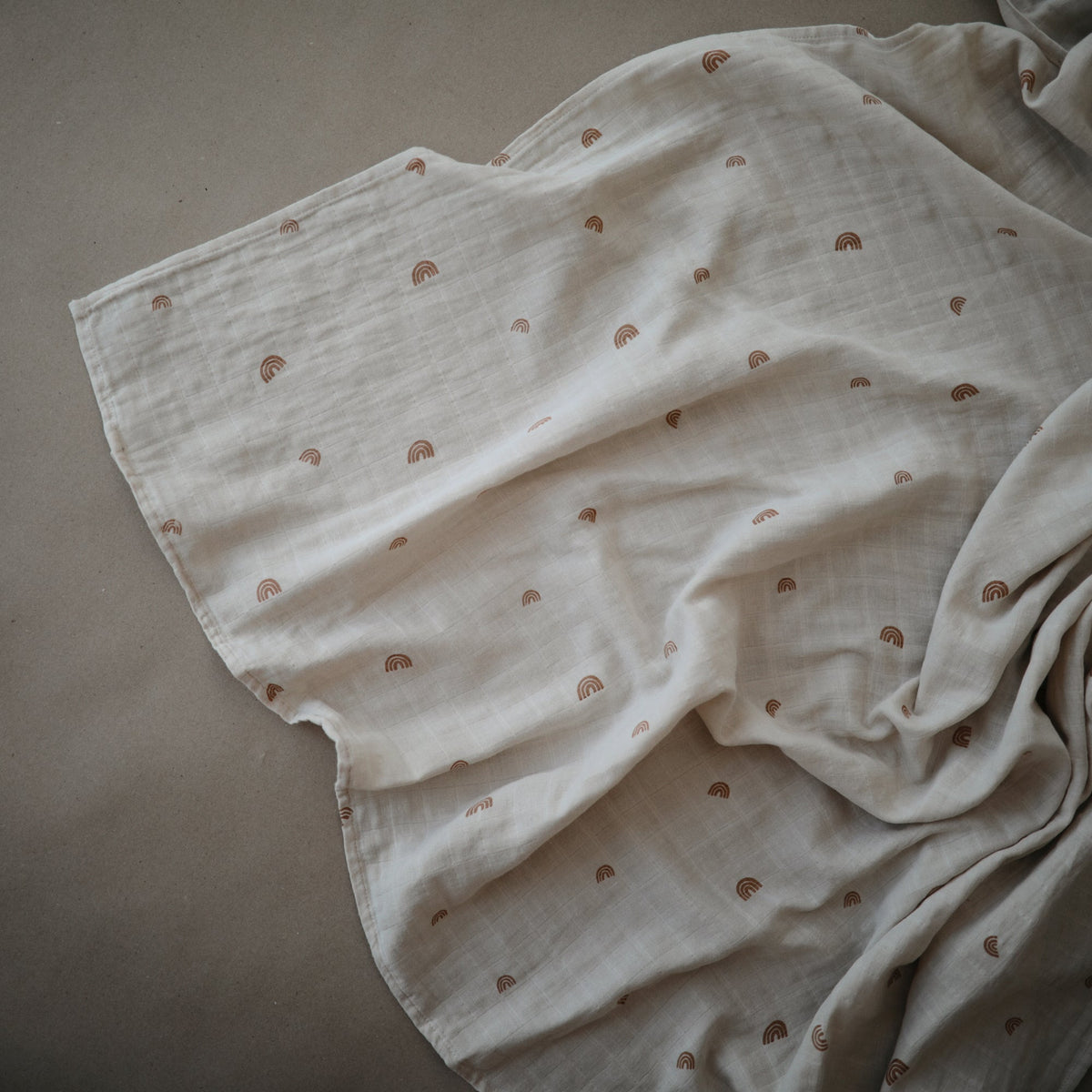 Mushie organic cotton muslin swaddle blanket