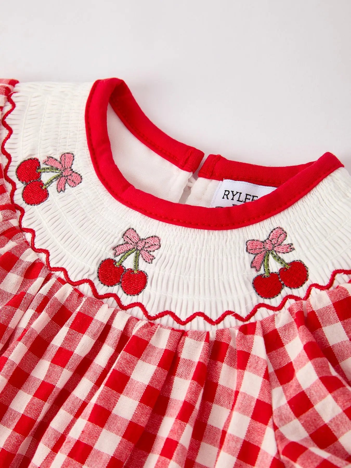 Red Cherry Bow Plaid Smocking Embroidery Girls Romper Rylee Faith Designs Everetts Place: Online Boutique