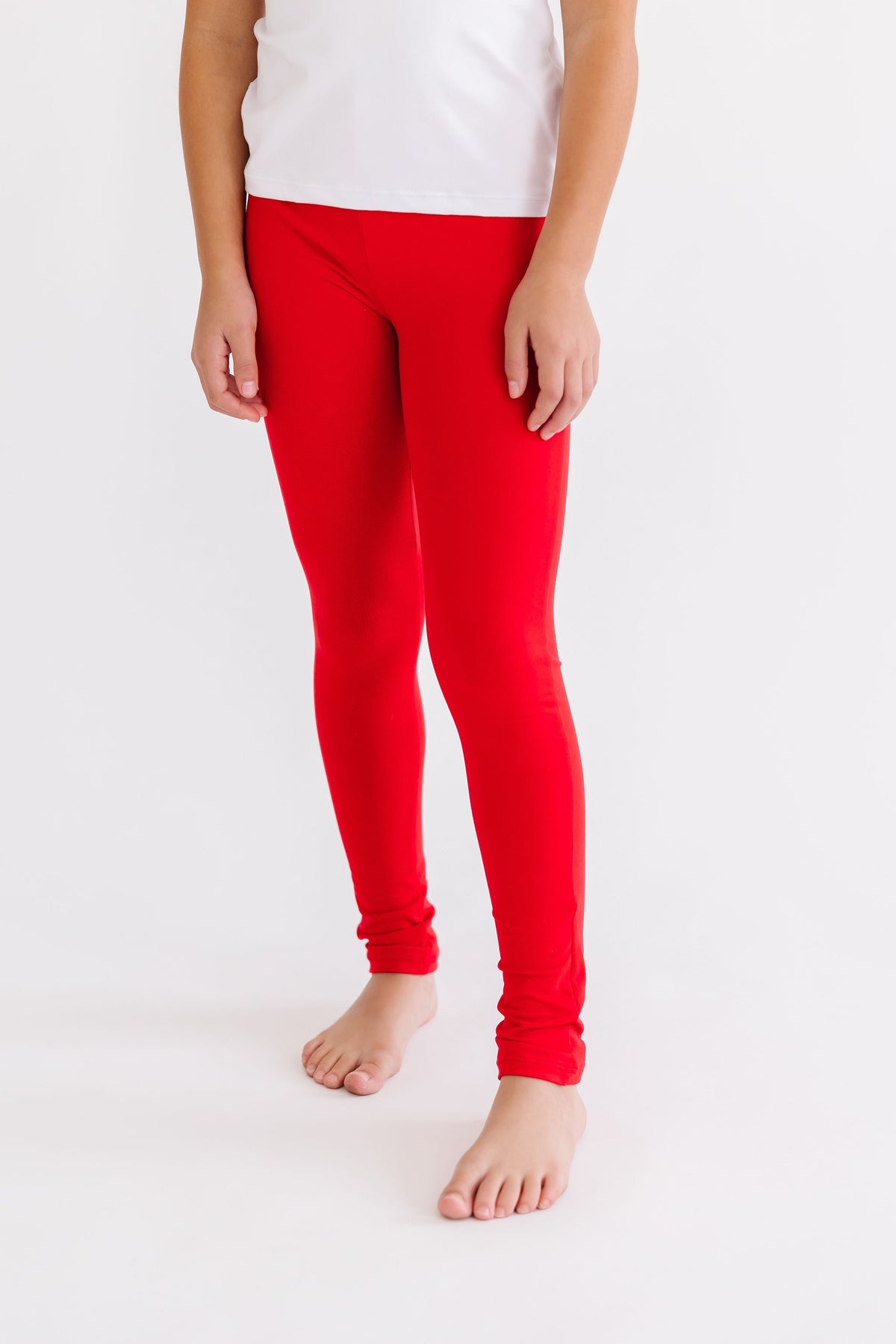 Mila & Rose organic red baby leggings.