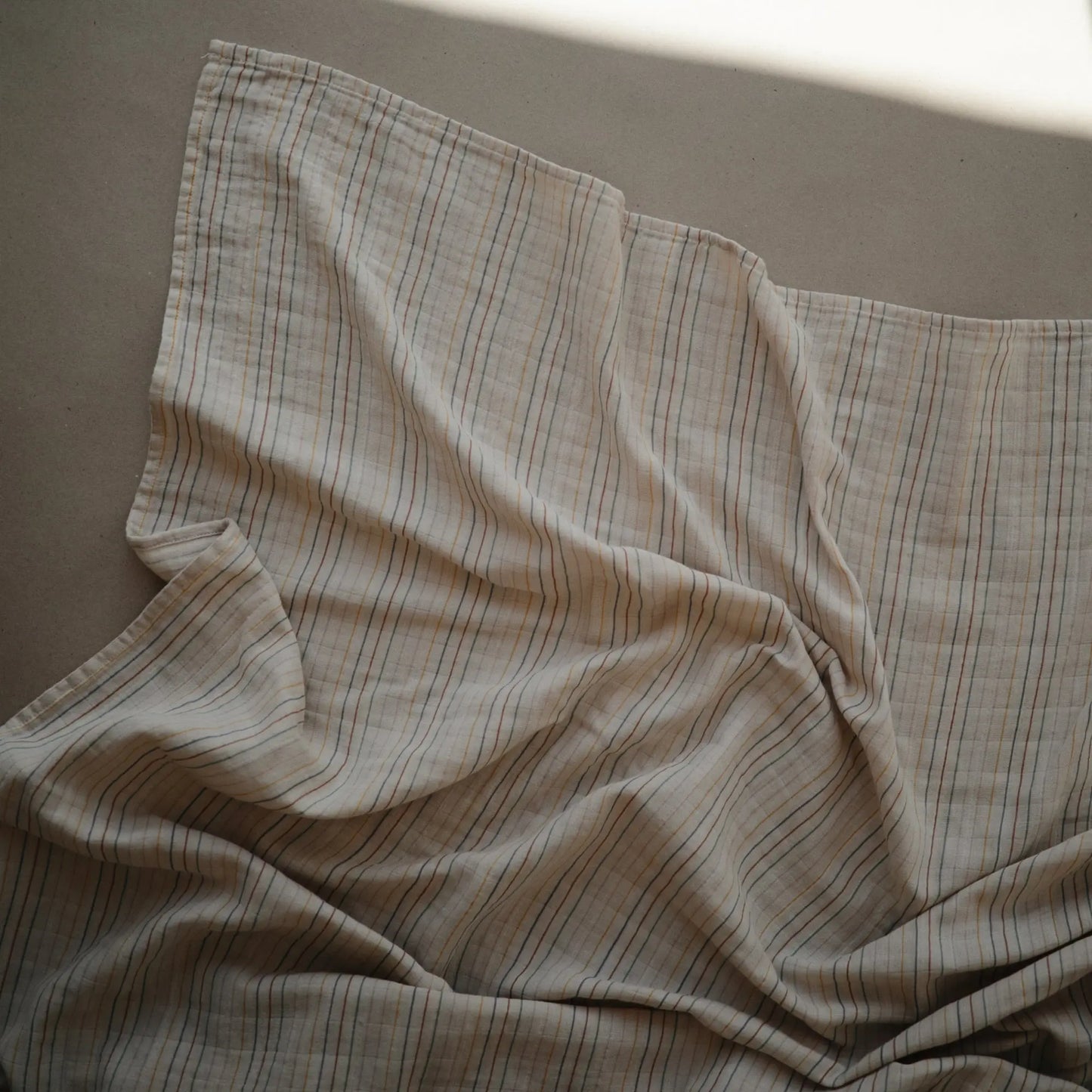 Organic Cotton Muslin Swaddle Blanket for Baby Cuddling and Nursing Mushie
