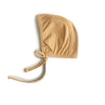 Mushie Ribbed Baby Bonnet Made with Organic Cotton for Warmth and Comfort - Apparel & Accessories > Clothing > Baby & Toddler Clothing > Baby One-Pieces Baby Clothes