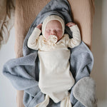 Mushie Ribbed Baby Bonnet Made with Organic Cotton for Warmth and Comfort - Apparel & Accessories > Clothing > Baby & Toddler Clothing > Baby One-Pieces Baby Clothes