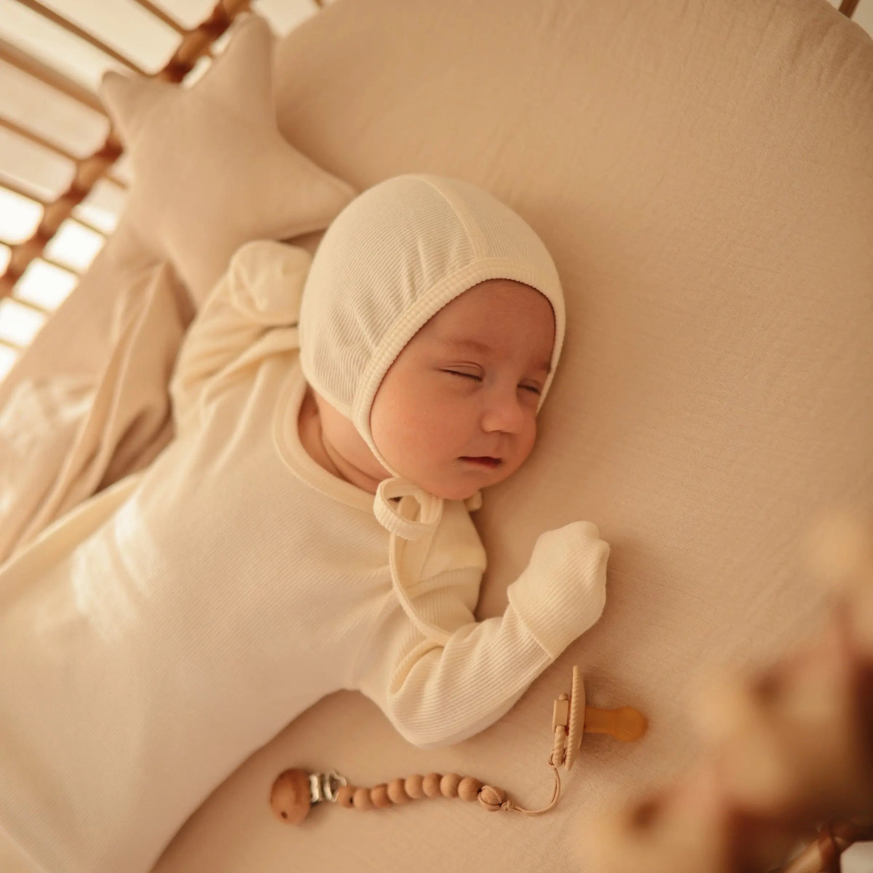 Mushie Ribbed Baby Bonnet Made with Organic Cotton for Warmth and Comfort - Apparel & Accessories > Clothing > Baby & Toddler Clothing > Baby One-Pieces Baby Clothes
