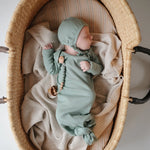 Mushie Ribbed Baby Bonnet Made with Organic Cotton for Warmth and Comfort - Apparel & Accessories > Clothing > Baby & Toddler Clothing > Baby One-Pieces Baby Clothes