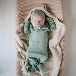 Mushie Ribbed Baby Bonnet Made with Organic Cotton for Warmth and Comfort - Apparel & Accessories > Clothing > Baby & Toddler Clothing > Baby One-Pieces Baby Clothes