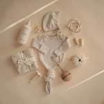 Mushie Ribbed Baby Bonnet Made with Organic Cotton for Warmth and Comfort - Apparel & Accessories > Clothing > Baby & Toddler Clothing > Baby One-Pieces Baby Clothes
