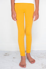 Mila & Rose mustard organic baby leggings. Soft, cozy pants for infants & toddlers.