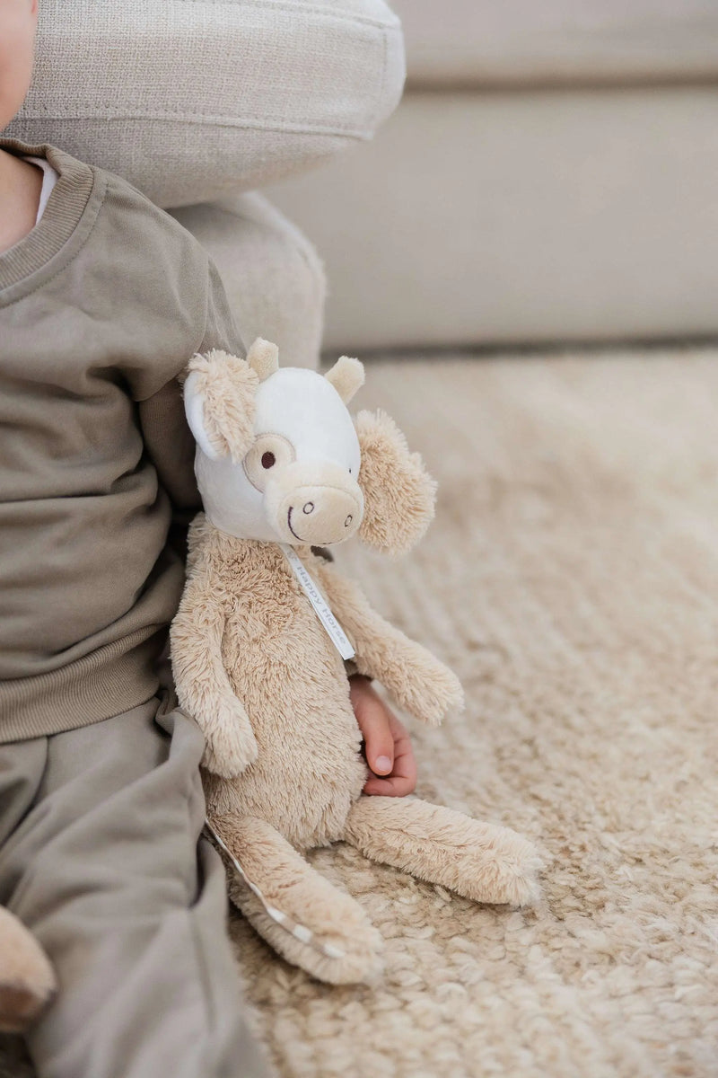 Cow Cruise no. 2 plush toy by Happy Horse with soft coat and long legs.