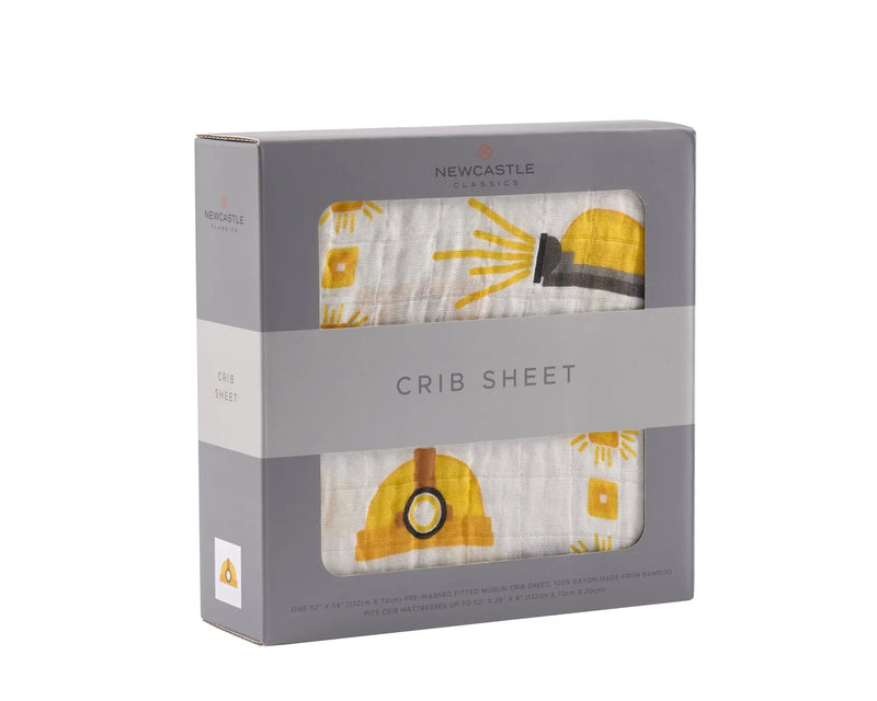 Hard Hat Bamboo Muslin Crib Sheet in packaging.