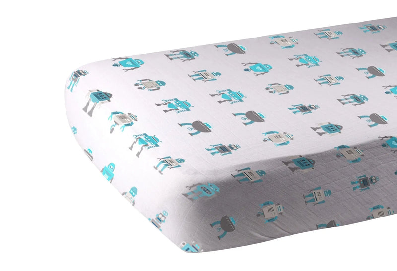 Robot Cotton Muslin Crib Sheet with playful robot pattern, breathable and soft material, fits standard crib mattresses.