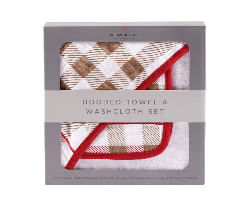 Plaid cotton hooded towel and washcloth set in packaging.