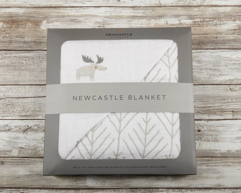 Mister Moose and Forest Arrow cotton muslin blanket in packaging.