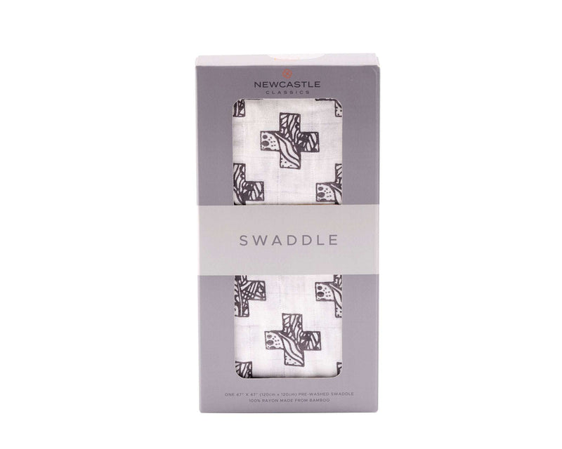 Nordic Stamp Bamboo Muslin Swaddle in packaging, featuring 100% natural bamboo fibers.
