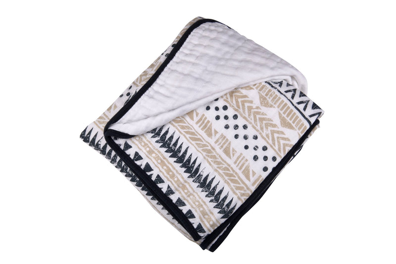 Pyramid Cotton Muslin Newcastle Blanket with geometric patterns, cozy and breathable four-layer design.