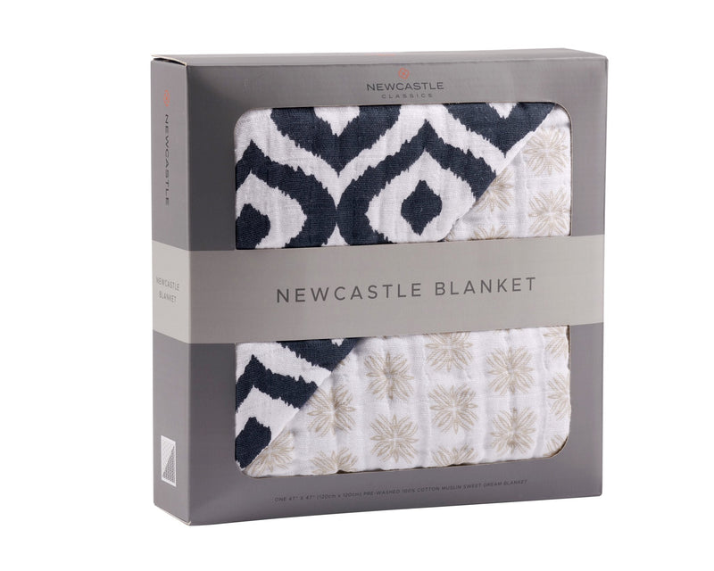 Morrocan Blue And Flower Child cotton muslin blanket in packaging.
