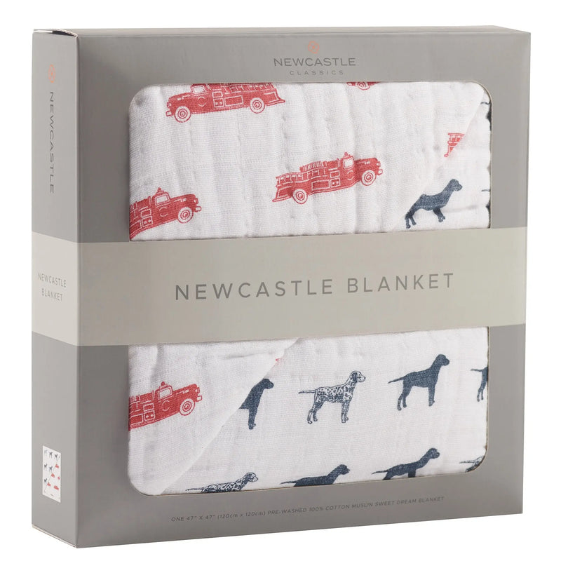 Fire Truck and Dalmatian design cotton muslin Newcastle blanket in packaging.