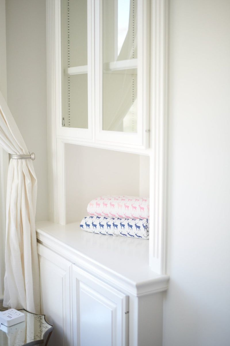 Blue Deer and Glacier Grey Plaid Cotton Muslin Blankets on Shelf