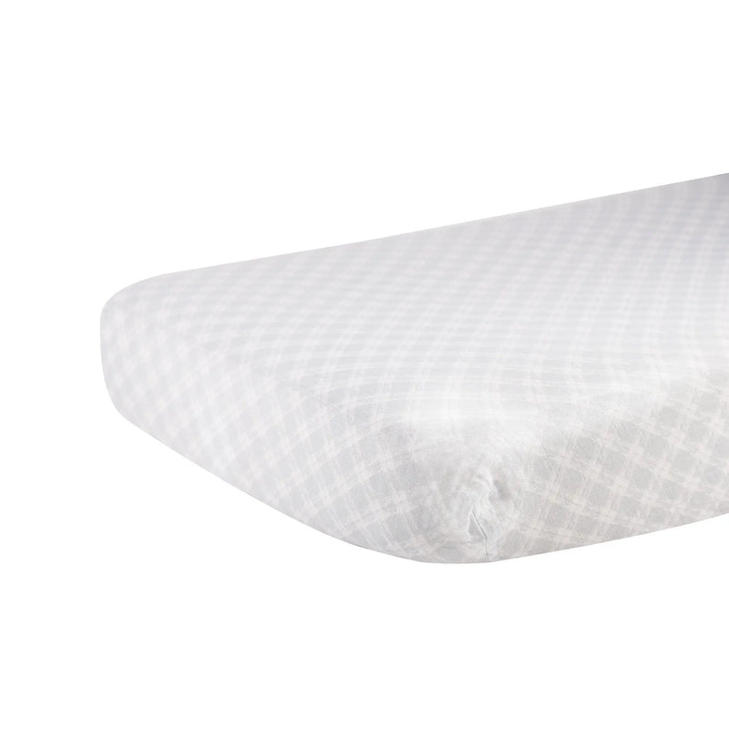 Glacier Grey Plaid Cotton Muslin Crib Sheet on mattress.