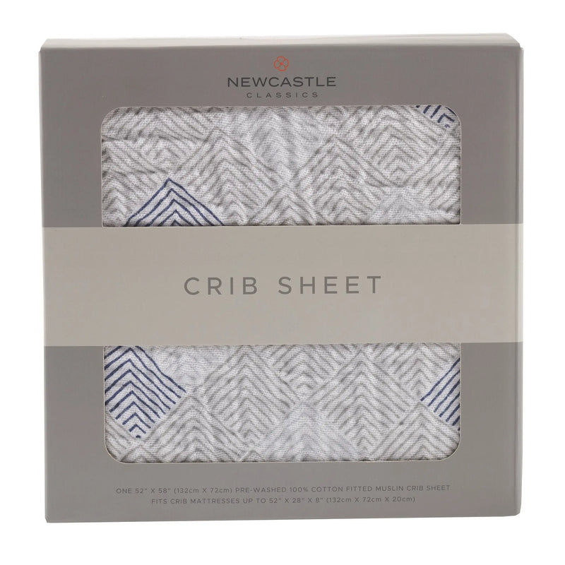 Mountain Peak Cotton Muslin Crib Sheet in packaging.