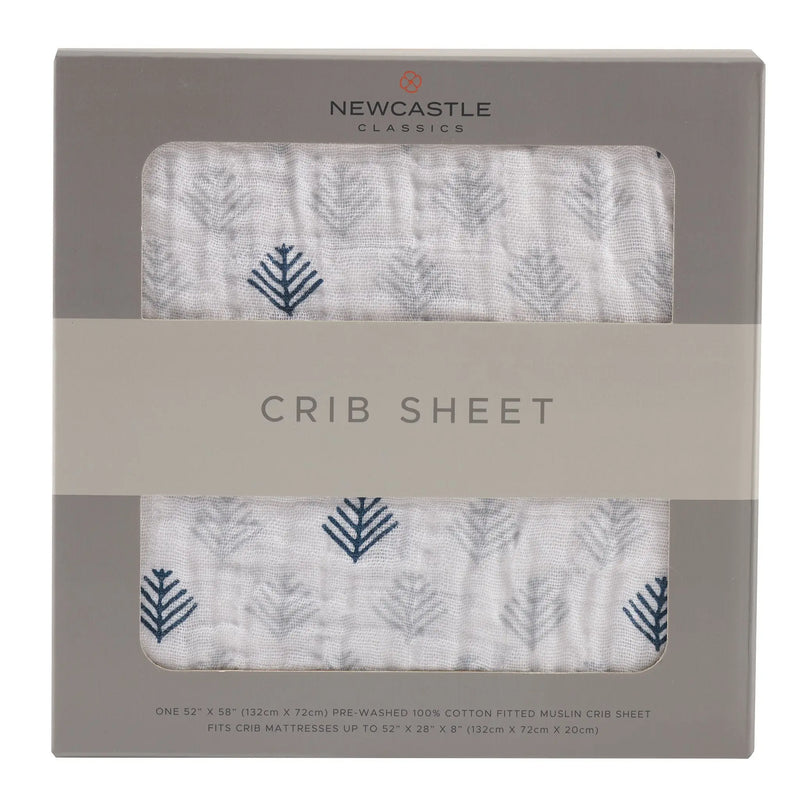Glacier Branch Cotton Muslin Crib Sheet packaging showing breathable cotton material with tree pattern design.