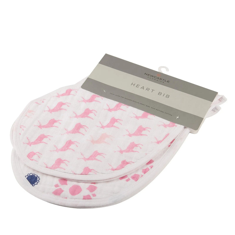 Two-pack of white cotton muslin bibs with pink heart designs, showcasing a "Pop of Pink" style.