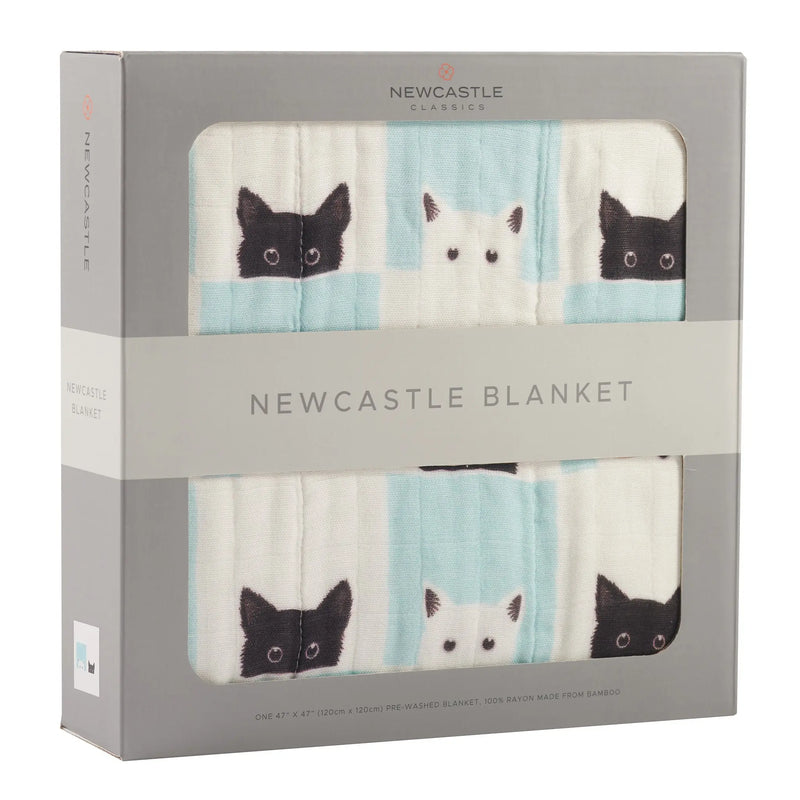 Peek-A-Boo Cats and White Bamboo Muslin Blanket in packaging.