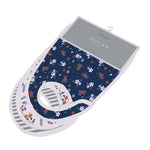 Set of three bamboo muslin snap bibs in a floral bloom print with front snap closures