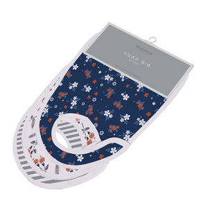 Set of three bamboo muslin snap bibs in a floral bloom print with front snap closures