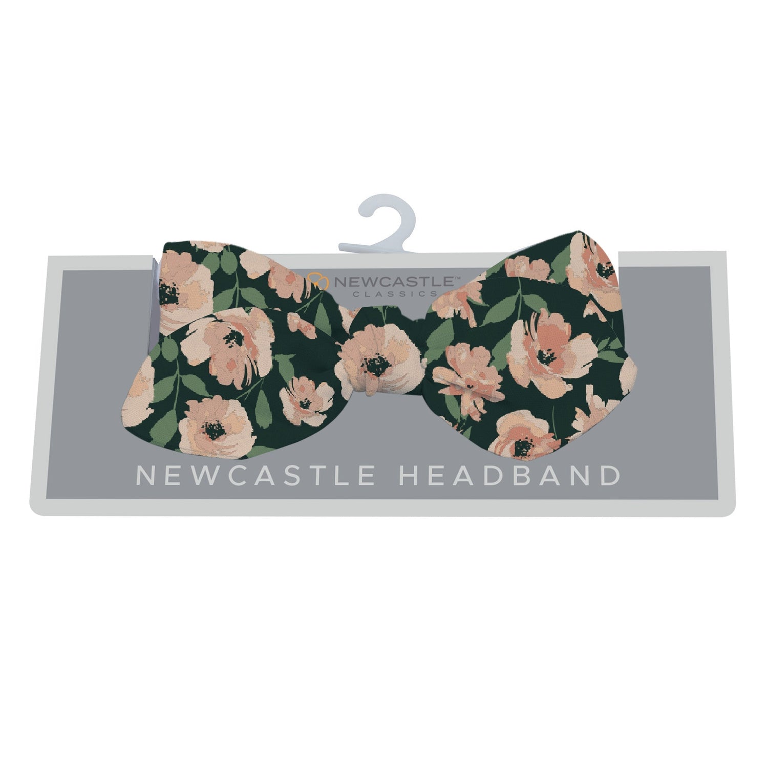 Baby headband in a warm floral print with sunset-toned flowers on a soft band