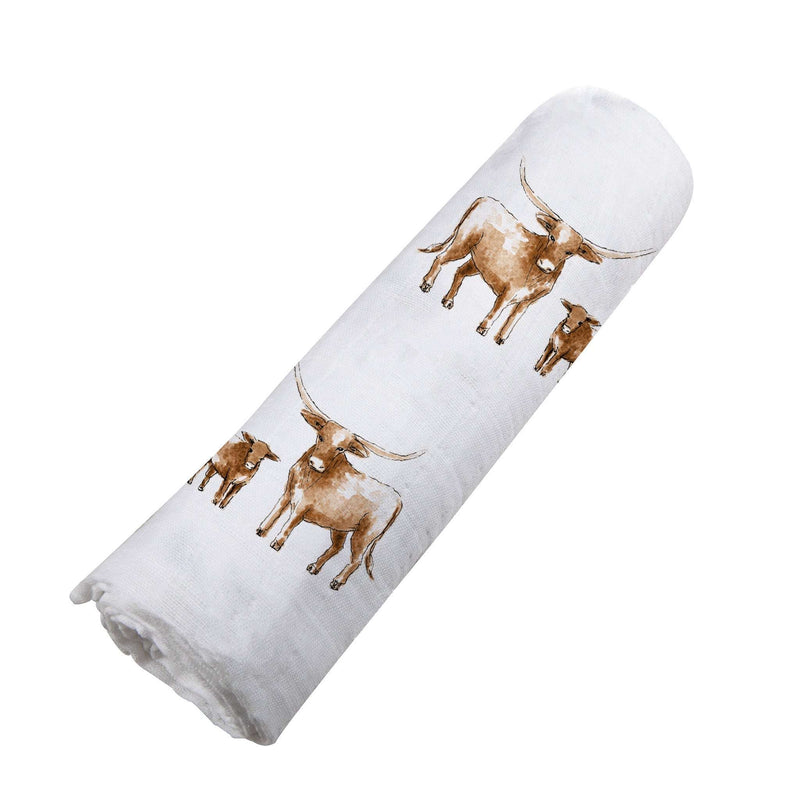 Longhorn Swaddle made from natural bamboo muslin, featuring a soft, breathable, and versatile design with longhorn print.