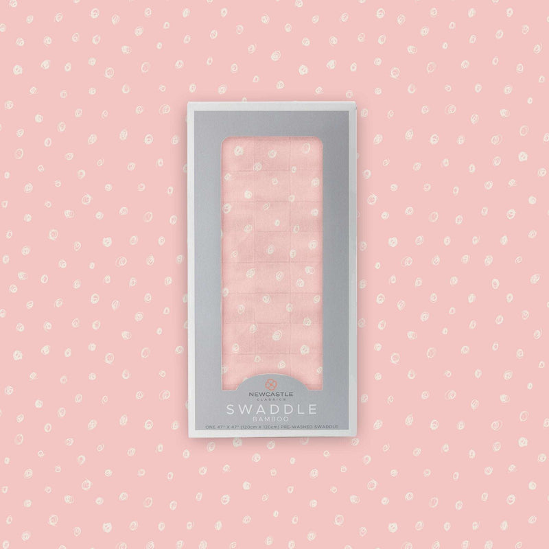 Pink Pearl Polka Dot Bamboo Swaddle in packaging, made from soft, breathable natural bamboo muslin.