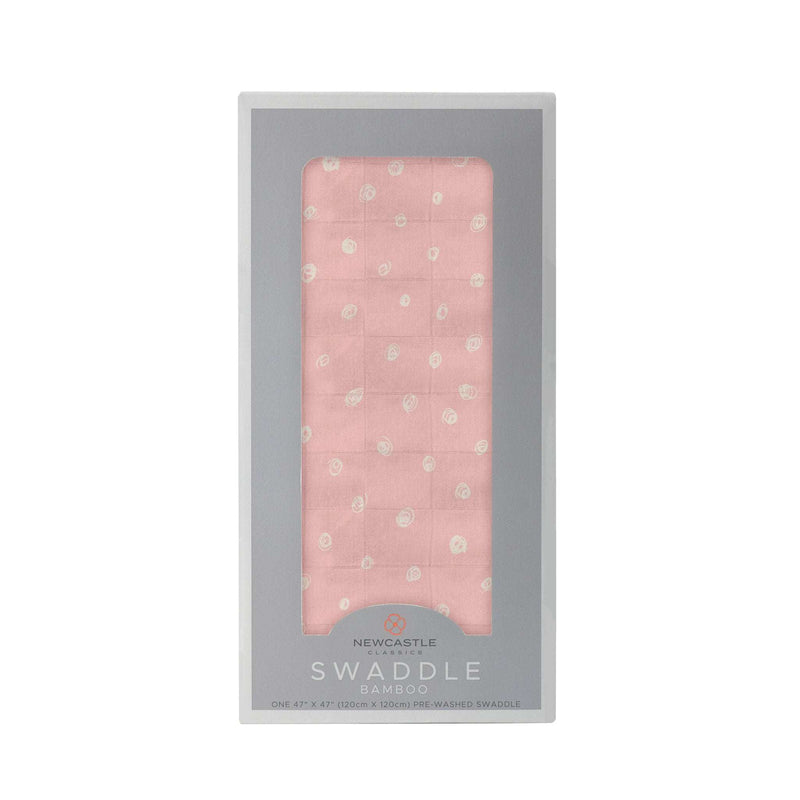 Pink Pearl Polka Dot bamboo swaddle in packaging, made from natural bamboo muslin, 47" x 47".