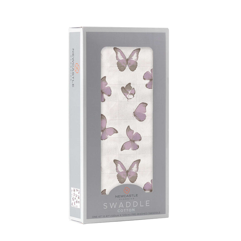 Winsome Butterflies Swaddle in packaging with butterfly design and 100% natural cotton muslin fabric.