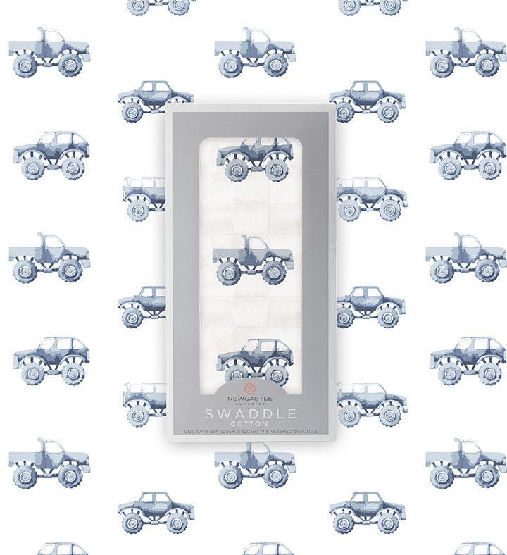 Indigo Monster Trucks cotton swaddle with breathable muslin fabric.