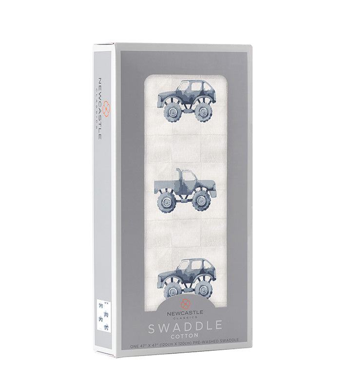 Indigo Monster Trucks Cotton Swaddle in package.