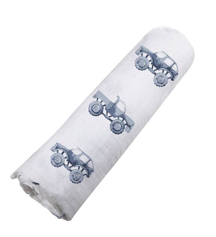 Indigo monster trucks cotton swaddle with breathable muslin fabric.