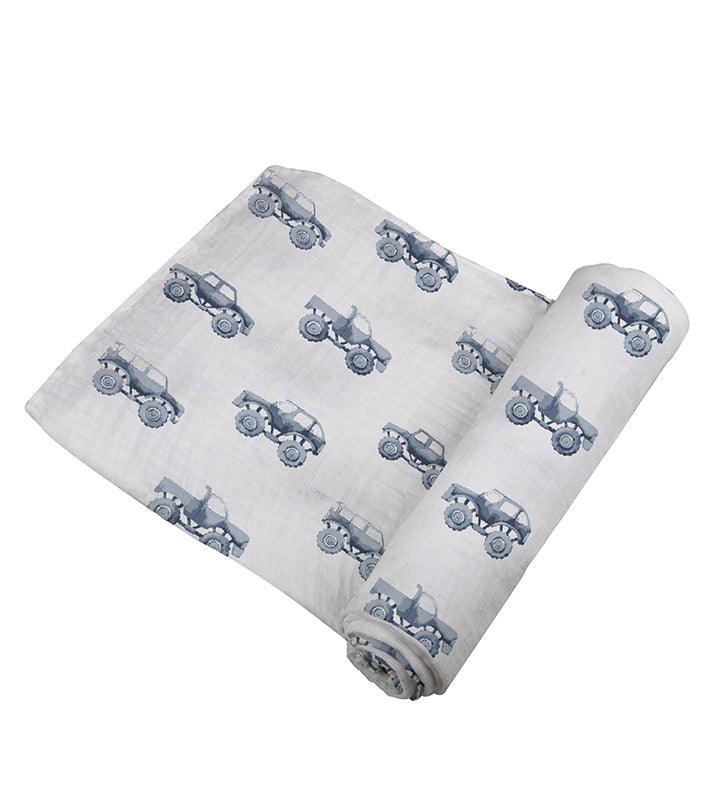 Indigo Monster Trucks Cotton Swaddle with breathable natural cotton muslin fabric.