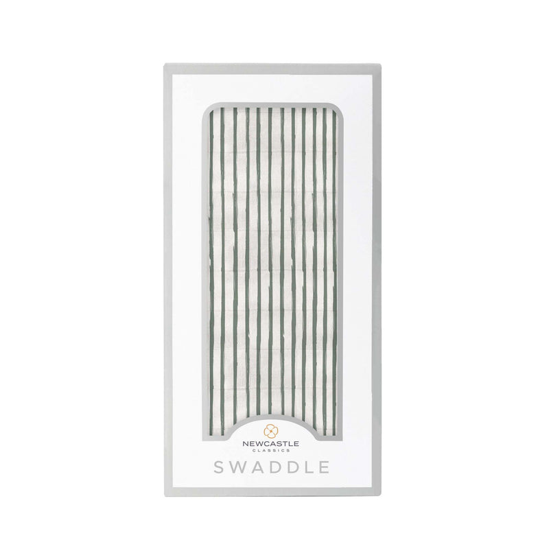 Sage green striped bamboo swaddle in packaging