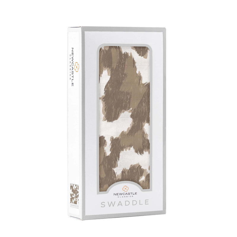 Yellowstone Cowhide Bamboo Swaddle in packaging, natural bamboo muslin, 47"x47".