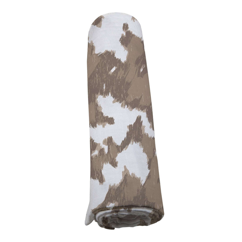 Yellowstone Cowhide Bamboo Swaddle in brown and white pattern.