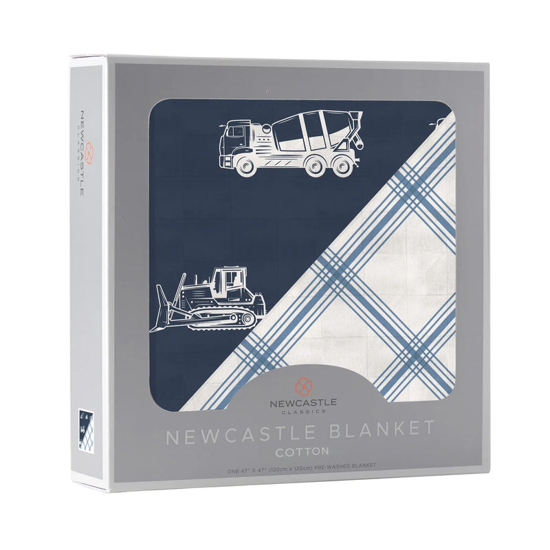 Newcastle blanket with things that go design and buffalo check plaid pattern in packaging.